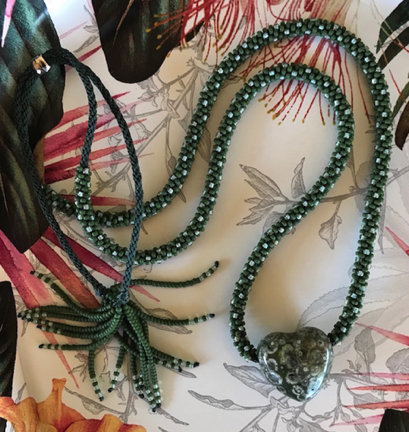 “REBIRTH” Hand-beaded and woven Kumihimo necklace w/Green Snowflake Obsidian heart focal *adjustable 22”-34”